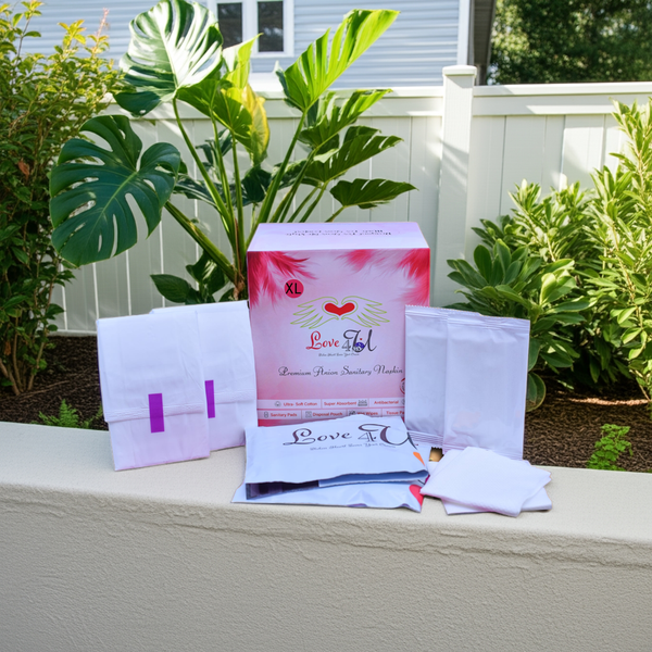 Product packaging with 'Love U' branding on a ledge outdoors.
