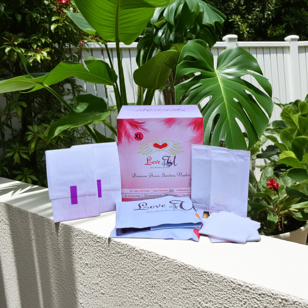 Product packaging with 'Love U' branding on a ledge with plants in the background